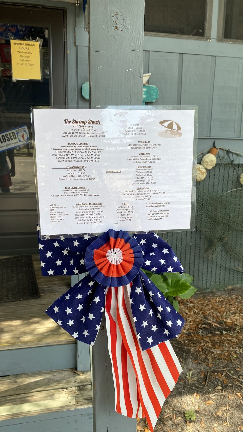 Printed menu featuring seafood dinners and entrees.